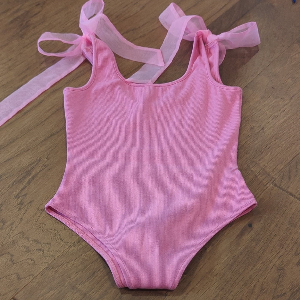 Elegant Pink Bodysuit with High-Cut Design
